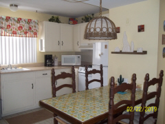 Living room into kitchen view